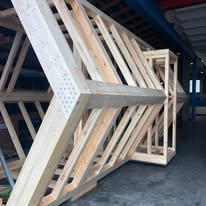 Wooden framing of hexagonal pod during construction